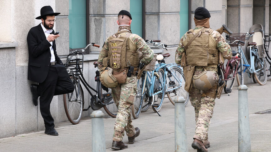 Belgian army personnel patrol a street as part of a deployment of soldiers outside Jewish institutions in Antwerp and Brussels following attacks at Jewish sites in Belgium and other European countries, in Antwerp, Belgium, March 23, 2026. REUTERS/Yves Herman