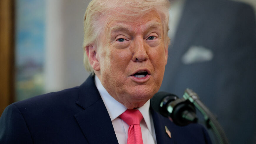U.S. President Donald Trump speaks as he attends Markwayne Mullin's swearing-in as Department of Homeland Security (DHS) Secretary, at the White House in Washington, D.C., U.S., March 24, 2026. REUTERS/Evan Vucci