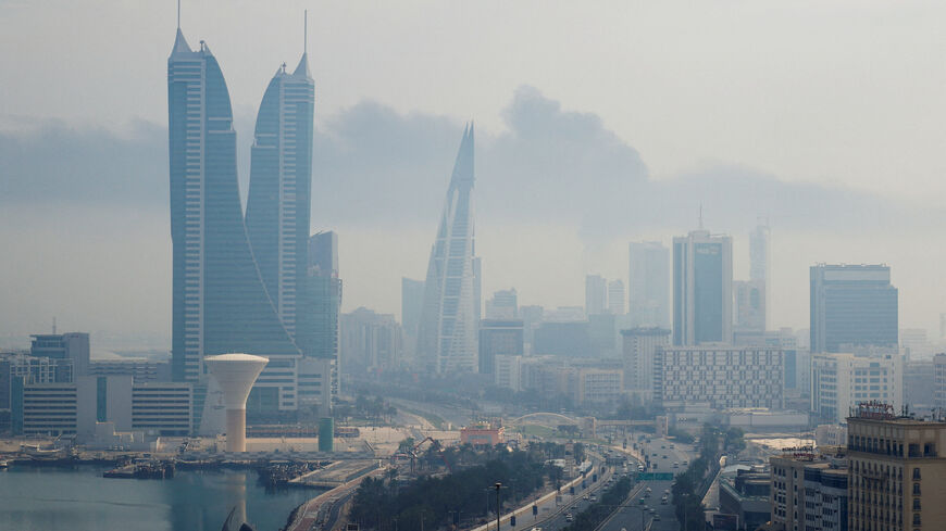 Smoke rises following a reported Iranian drone strike on the fuel storage facility of Bahrain International Airport, amid the U.S.-Israeli conflict with Iran, in Muharraq, Manama, Bahrain, March 12, 2026. REUTERS/Stringer