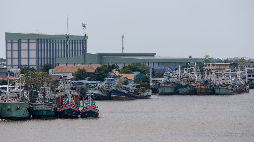 Trawlers are docked at a pier as rising diesel prices make fishing operations unprofitable, in Samut Sakhon province, Thailand, March 25, 2026. REUTERS/Chalinee Thirasupa