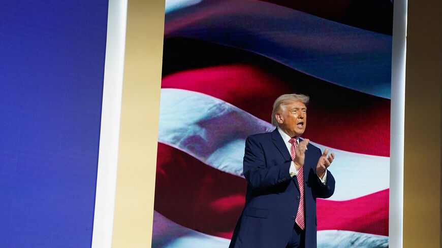 U.S. President Donald Trump applauds onstage before delivering remarks at the Future Investment Initiative (FII) Institute's summit at the Faena Forum in Miami Beach, Florida, U.S., March 27, 2026. REUTERS/Elizabeth Frantz