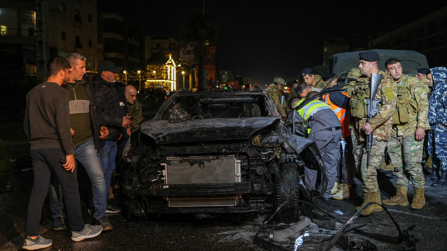 Emergency personnel operate around a burned car following a targeted Israeli strike, amid escalating hostilities between Israel and Hezbollah, as the U.S.-Israel conflict with Iran continues, in Khaldeh, Lebanon, March 31, 2026. REUTERS/Stringer
