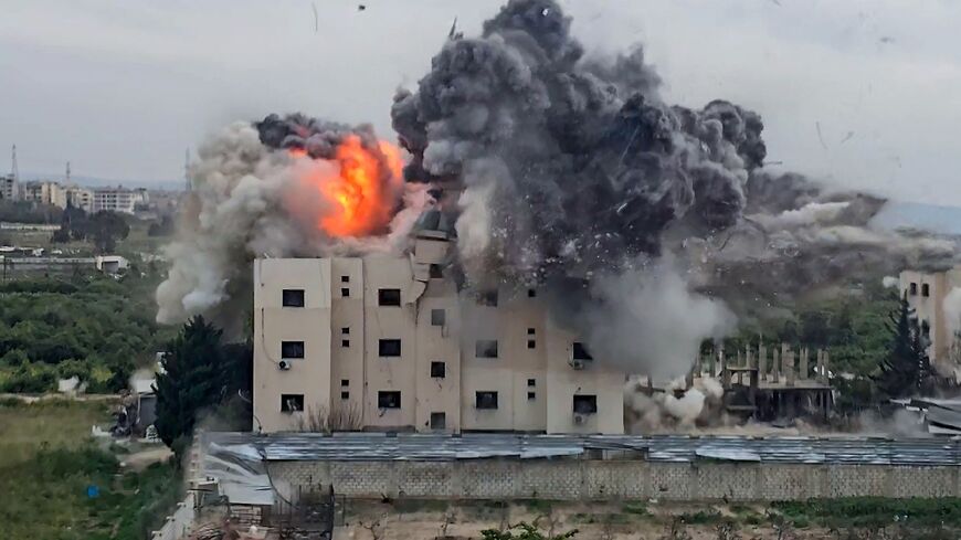 A fireball errupts from the site of an Israeli stike in a southern Lebanese village 