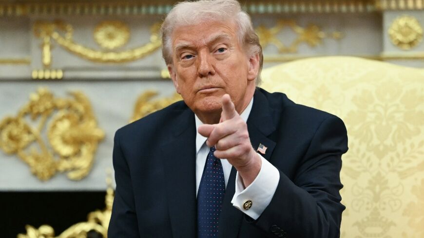 US President Donald Trump speaks during a meeting with German Chancellor Friedrich Merz in the Oval Office