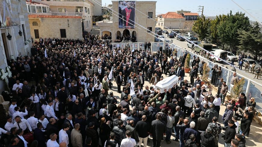 Hundreds of people buried their parish priest Father Pierre Rai