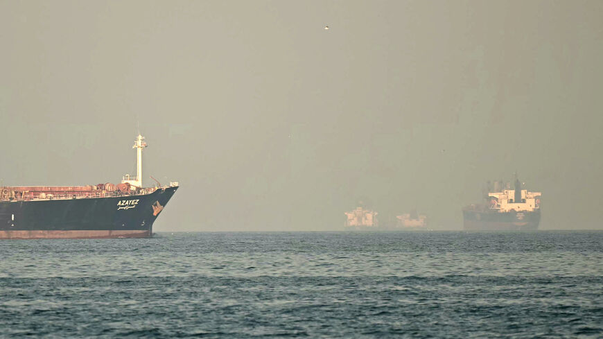 Cargo ships and tankers are seen off coast city of Fujairah, in the Strait of Hormuz in the northern Emirate on Feb. 25, 2026. 