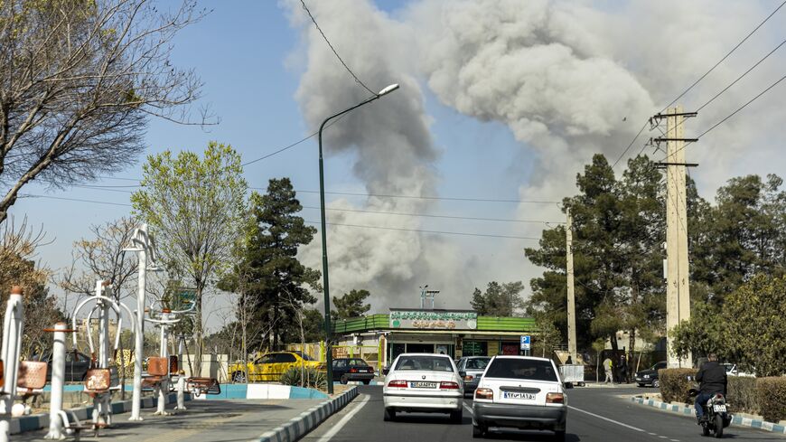 Plumes of smoke rise following an explosion on March 5, 2026, in Tehran, Iran.