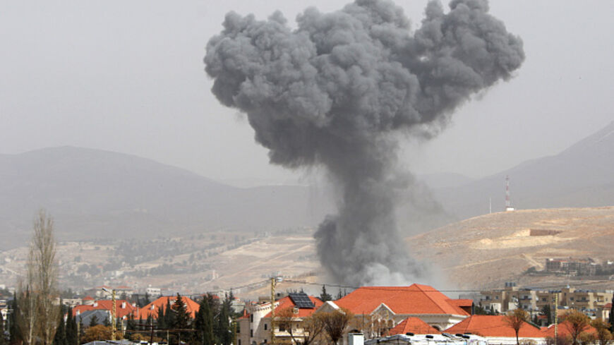 Smoke rises from the site of an Israeli air strike that targeted the village of Douris in the Bekaa valley on March 12, 2026. (Nidal SOLH / AFP via Getty Images)