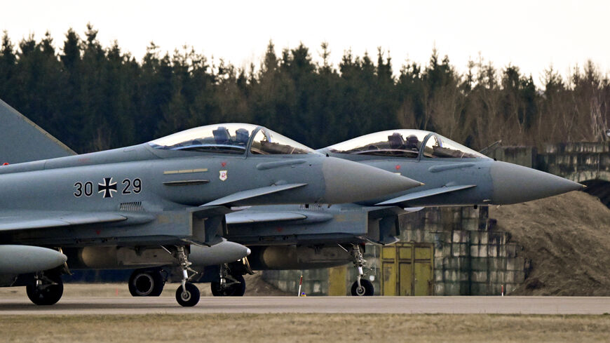 Two Typhoon Eurofighter jets of the Quick Reaction Alert (QRA) of the German air force (Luftwaffe) take off for training during a media day at the military Laage Air Base, northeastern Germany, on March 11, 2026. 