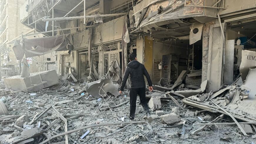 Debris at the site of overnight Israeli airstrikes in the southern suburbs of Beirut