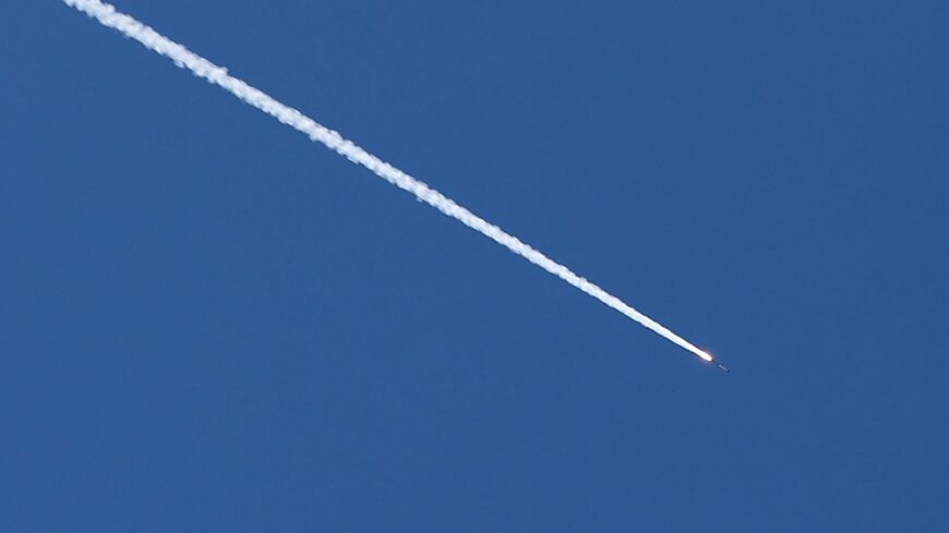 A rocket trail is seen in the sky above the Israeli coastal city of Tel Aviv on March 5, 2026