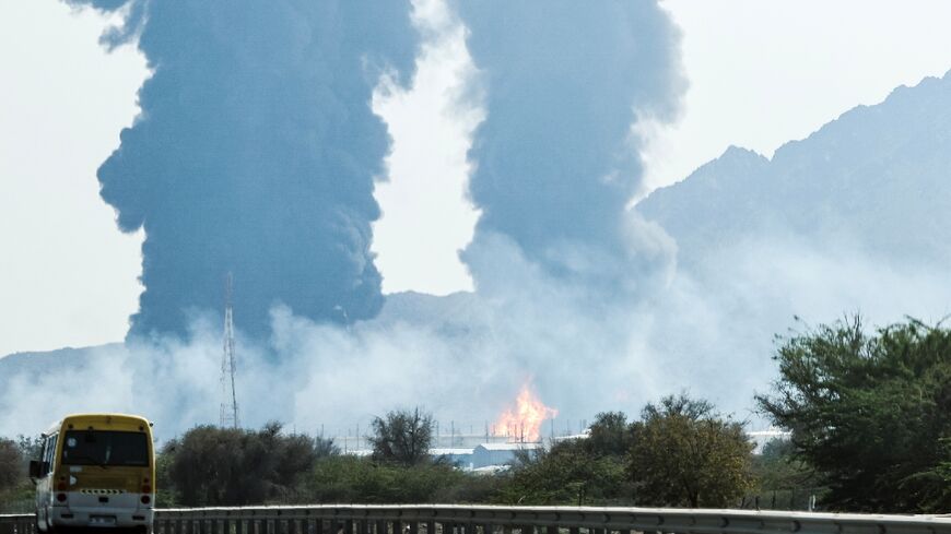 Clouds of dark black smoke seen coming from Fujairah in the United Arab Emirates, which is home to a major port and oil export terminal