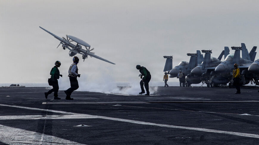 FILE PHOTO: An E-2D Hawkeye surveillance aircraft launches from the flight deck of the U.S. Navy Nimitz-class aircraft carrier USS Abraham Lincoln during thge Operation Epic Fury attack on Iran March 31, 2026. U.S. Navy/Handout via REUTERS/File Photo