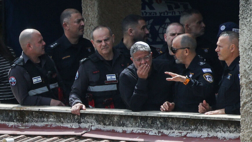 Israeli National Security Minister Itamar Ben-Gvir visits the site of a projectile impact, as the U.S.-Israeli conflict with Iran continues, in Haifa, Israel, April 6, 2026. REUTERS/Shir Torem
