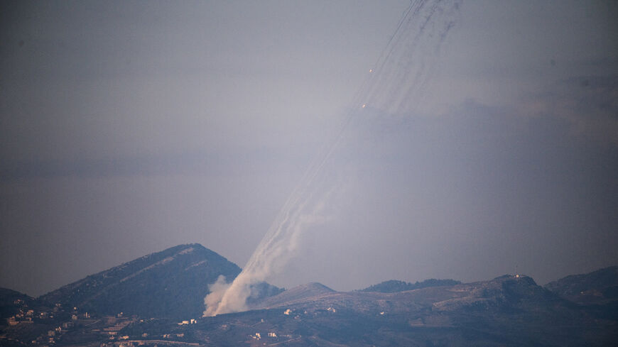 FILE PHOTO: Rockets being launched from Lebanon towards Israel as seen from the Israeli side of the border with Lebanon, following an escalation between Hezbollah and Israel amid the U.S.-Israeli conflict with Iran,  March 3, 2026. REUTERS/Gil Eliyahu/File Photo
