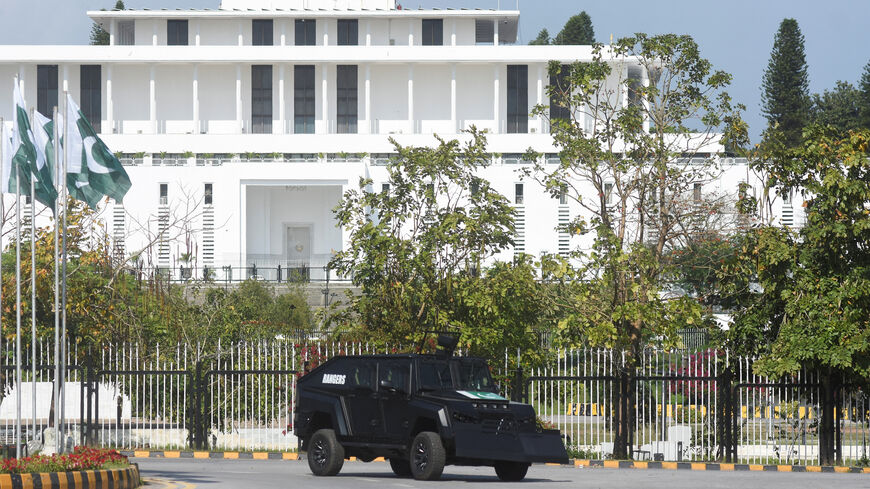 A security vehicle moves past the President house as Pakistan gears up to host the U.S. and Iran for peace talks, in Islamabad, Pakistan, April 9, 2026. REUTERS/Waseem Khan