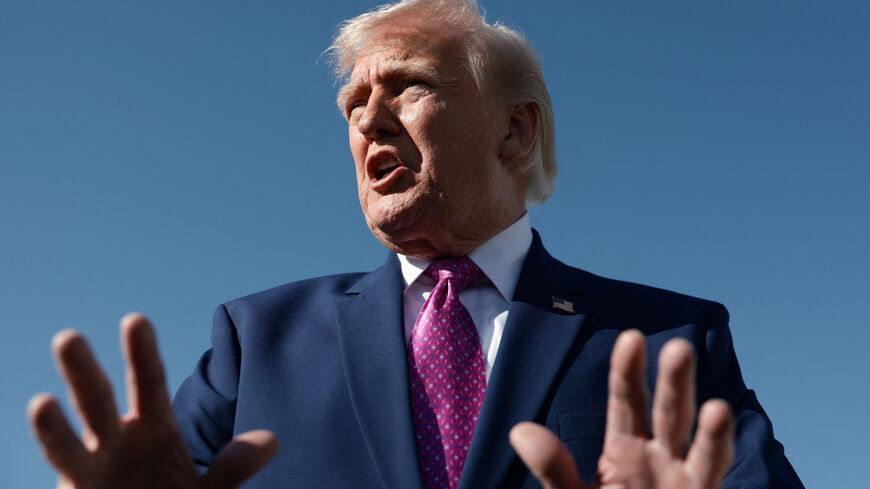 U.S. President Donald Trump speaks to the media, before boarding Air Force One on his way to Virginia, at Joint Base Andrews in Maryland, U.S., April 10, 2026. REUTERS/Evelyn Hockstein
