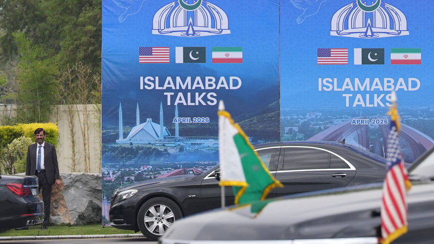 A Pakistani official stands during the arrival of the U.S. Vice President JD Vance for talks with Iranian officials in Islamabad, Pakistan, Saturday, April 11, 2026.     Jacquelyn Martin/Pool via REUTERS