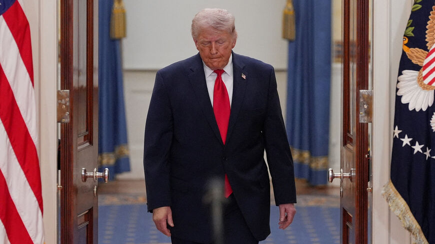 FILE PHOTO: President Donald Trump arrives to speak about the Iran war from the Cross Hall of the White House on Wednesday, April 1, 2026, in Washington.     Alex Brandon/Pool via REUTERS/File Photo