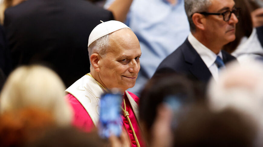 Pope Leo XIV reacts as he presides over a Prayer Vigil and Rosary for Peace, in Saint Peter's Basilica at the Vatican, April 11, 2026. REUTERS/Remo Casilli