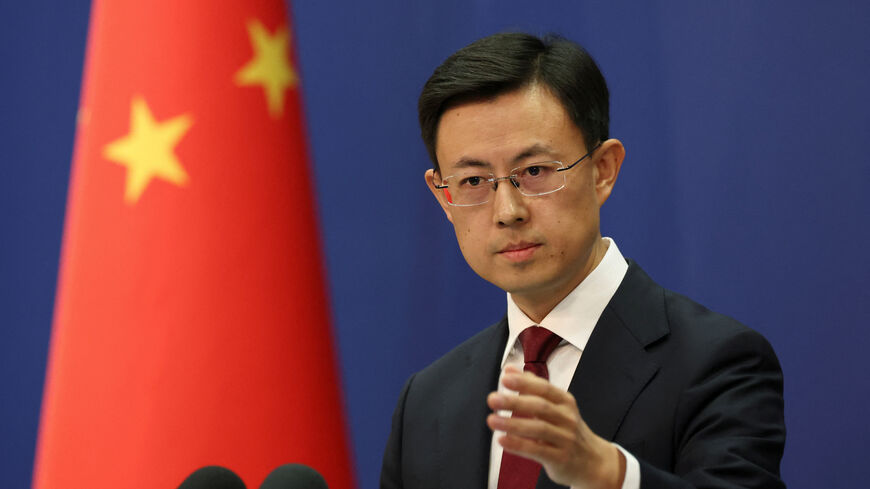 Chinese Foreign Ministry spokesperson Guo Jiakun takes a question from a journalist at a press conference in Beijing, China, January 7, 2025. REUTERS/Florence Lo