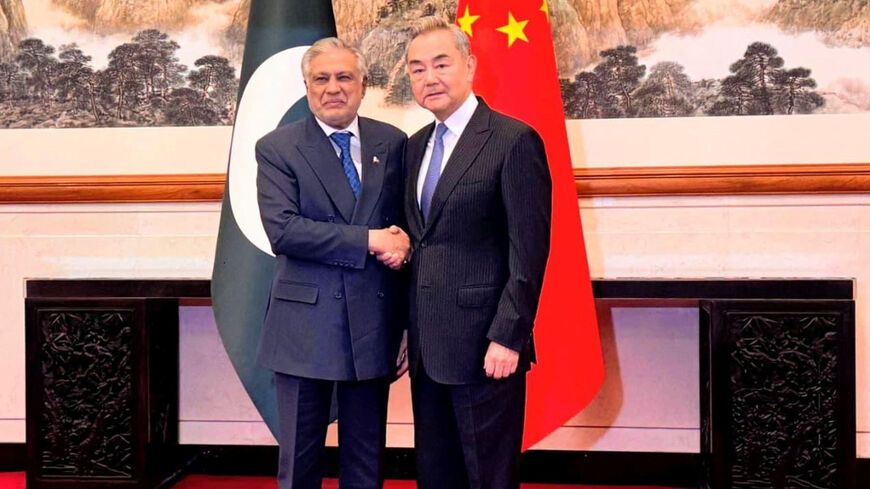 Pakistan's Deputy Prime Minister and Minister for Foreign Affairs Senator Mohammad Ishaq Dar meets with Chinese Foreign Minister Wang Yi, at the Diaoyutai State Guesthouse in Beijing, China, March 31, 2026. Press Information Department (PID)/Handout via REUTERS THIS IMAGE HAS BEEN SUPPLIED BY A THIRD PARTY.