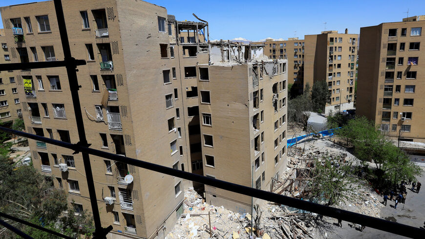 A residential building damaged by a strike on March 4, in Tehran, Iran, April 14, 2026. REUTERS/Thaier Al Sudani