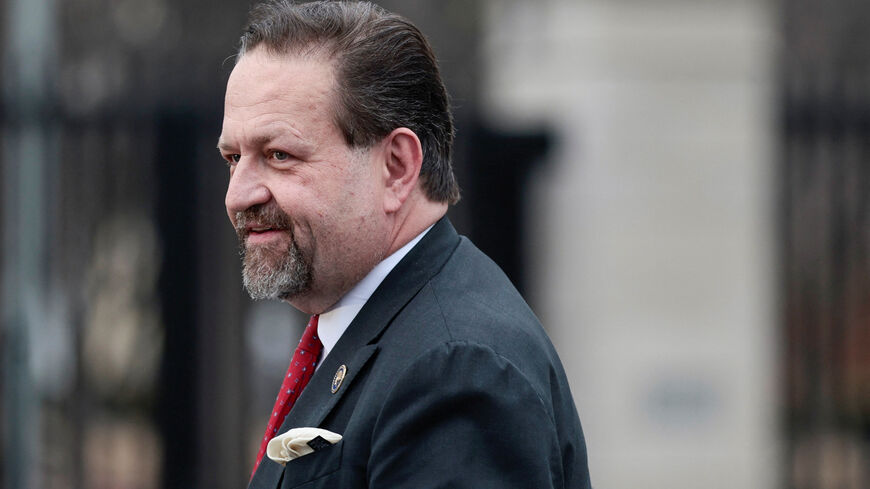 Sebastian Gorka, Deputy Assistant to U.S. President Donald Trump, walks to an interview outside the White House in Washington, D.C., U.S., December 18, 2025. REUTERS/Evelyn Hockstein/File Photo