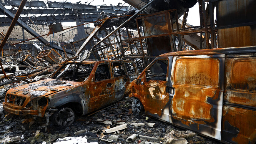 Burnt-out vehicles at the site of a car repair shop and dealership damaged by a strike, amid the U.S.-Israeli conflict with Iran, in Tehran, Iran, March 28, 2026. Majid Asgaripour/WANA (West Asia News Agency) via REUTERS