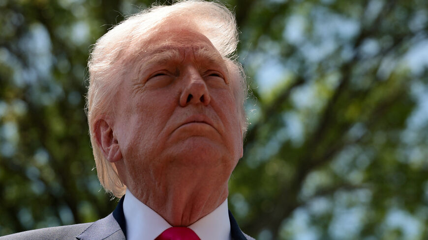 U.S. President Donald Trump speaks to the media, as he departs the White House for Las Vegas, Nevada, in Washington, D.C., U.S., April 16, 2026. REUTERS/Jessica Koscielniak
