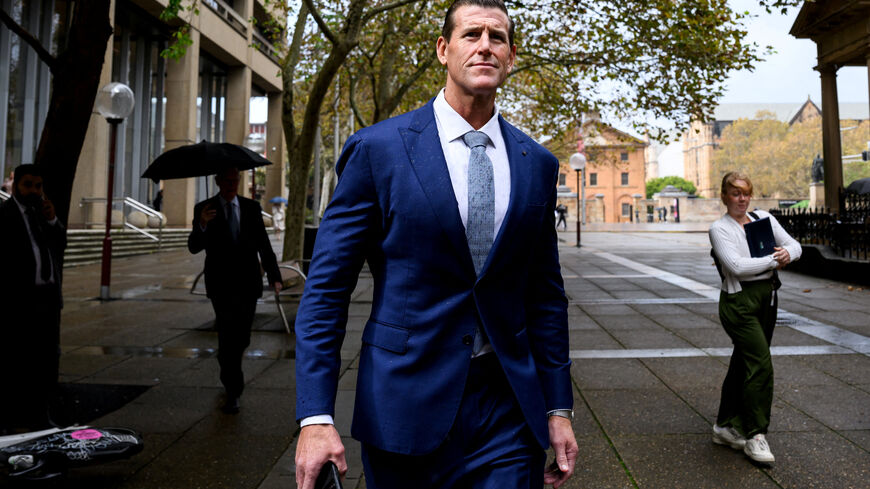 FILE PHOTO: Former Australian Defence Force soldier Ben Roberts-Smith walks during a break outside the Federal Court of Australia, in Sydney, Australia, May 1, 2025.  AAP/Bianca De Marchi via REUTERS/File Photo