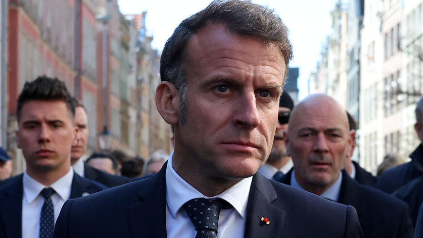 French President Emmanuel Macron walks during his meeting with Poland's Prime Minister Donald Tusk in Gdansk, Poland, April 20, 2026. REUTERS/Kacper Pempel