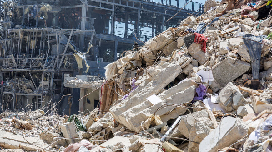Workers clean a restaurant that was damaged by an Israeli strike, amid a temporary ceasefire between Lebanon and Israel, in Tyre, Lebanon, April 23, 2026. REUTERS/Zohra Bensemra/File Photo