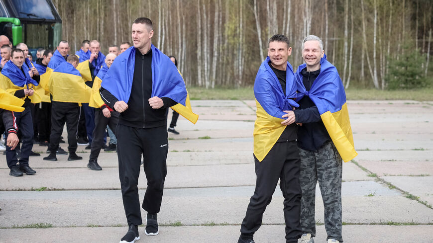 Ukrainian prisoners of war (POWs) react after a swap, amid Russia's attack on Ukraine, at an unknown location in Ukraine April 24, 2026. REUTERS/Anatolii Stepanov