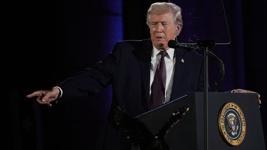 U.S. President Donald Trump points as he delivers a speech during the National Republican Congressional Committee (NRCC) annual fundraising dinner in Washington, D.C., U.S., March 25, 2026. REUTERS/Ken Cedeno