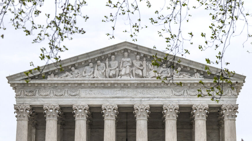 FILE PHOTO: The U.S. Supreme Court building during proceedings in pending appeals at the Supreme Court in Washington, D.C., U.S., March 30, 2026. REUTERS/Evelyn Hockstein/File Photo