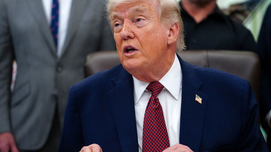 FILE PHOTO: U.S. President Donald Trump speaks about research into mental health treatments in the Oval Office of the White House in Washington, D.C., April 18, 2026. REUTERS/Nathan Howard/File photo