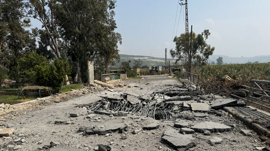 The damaged Qasmiyeh Bridge over the Litani River, Lebanon, March 19, 2026. Picture taken with a mobile phone. REUTERS/Ali Hankir/File Photo