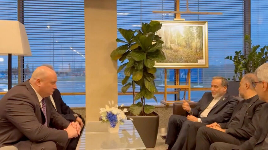 Iran's Foreign Affairs Minister Abbas Araqchi talks with officials, according to Iran's media, during his visit to Russia for talks with Russian President Vladimir Putin, in a place given as St. Petersburg, Russia, in this screenshot from a video released on April 27, 2026. Seyed Abbas Araghchi via Telegram/Handout via REUTERS