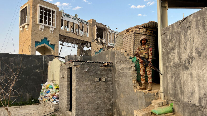 FILE PHOTO: An army soldier stands at a post at the Friendship Gate, following the exchanges of fire between Pakistan and Afghanistan forces, at the border crossing between the two countries, in Chaman, Pakistan February 27, 2026. Picture taken with a mobile phone. REUTERS/Abdul Khaliq Achakzai/File Photo
