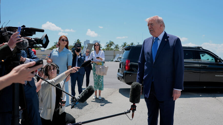 U.S. President Donald Trump speaks to the media before departing Palm Beach International Airport en route to Joint Base Andrews, in West Palm Beach, Florida, U.S., April 25, 2026. REUTERS/Kylie Cooper