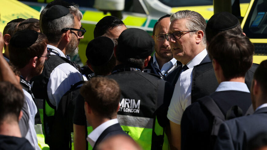 British Prime Minister Keir Starmer makes a visit to the Golders Green area, which is home to a large Jewish population, after a man was arrested on Wednesday following a stabbing incident in which two Jewish men were wounded, in London, Britain, April 30, 2026. REUTERS/Hannah McKay