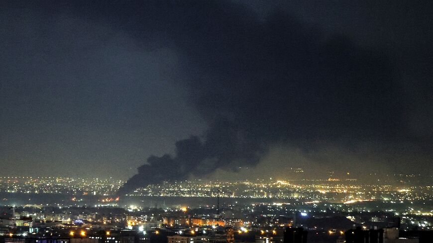 Smoke rises from the site of a US-Israeli strike on the Iranian capital Tehran on April 7, 2026