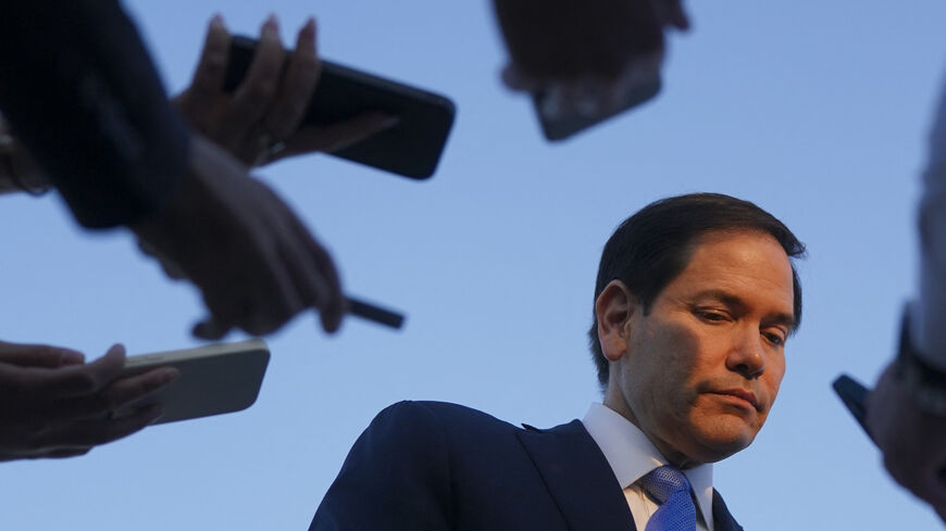 US Secretary of State Marco Rubio speaks to the press as he departs Tel Aviv for Qatar following an official visit, at Ben Gurion International Airport, near Lod, Israel, September 16, 2025. Israel heavily bombarded Gaza City on September 16 2025, witnesses told AFP, after US Secretary of State Marco Rubio backed Israeli Prime Minister Benjamin Netanyahu's new offensive there and its stated goal of eradicating Hamas. (Photo by NATHAN HOWARD / POOL / AFP) (Photo by NATHAN HOWARD/POOL/AFP via Getty Images)