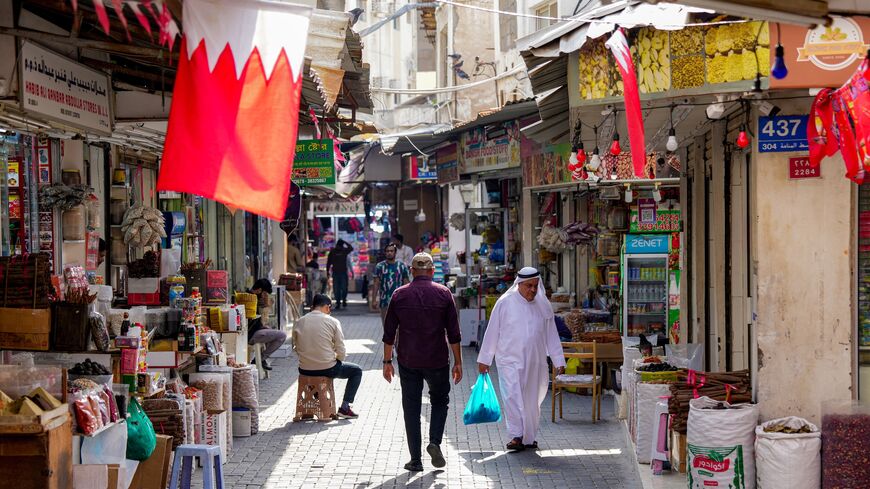 People walk along an alley at a bazaar in Bahrain's capital, Manama, on March 11, 2026. 