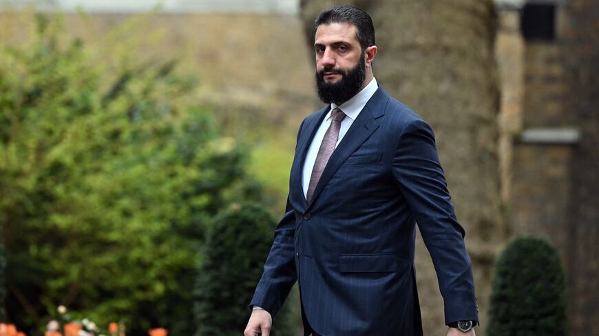 Syria's President Ahmed al-Sharaa arrives ahead of a meeting with Britain's Prime Minister Keir Starmer at 10 Downing Street in central London on March 31, 2026. 