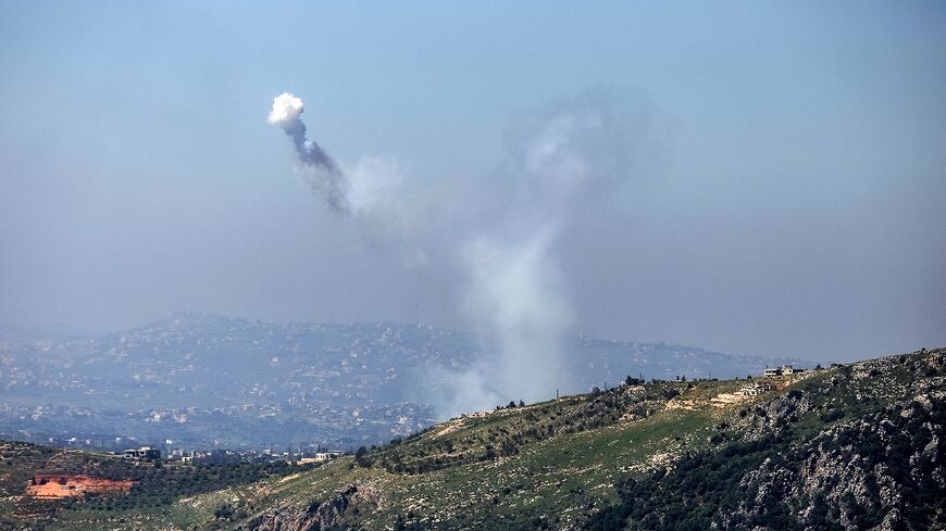 Smoke from Israeli shelling on the village of Yohmor, seen from the southern Lebanese area of Marjeyoun 