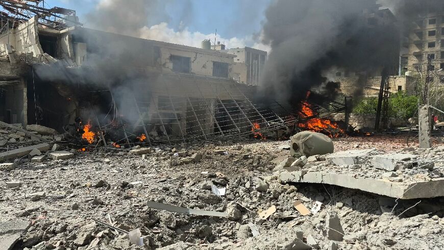 An Israeli strike, one of multiple on the southern Lebanese city of Nabatiyeh on Friday, killed 13 State Security personnel