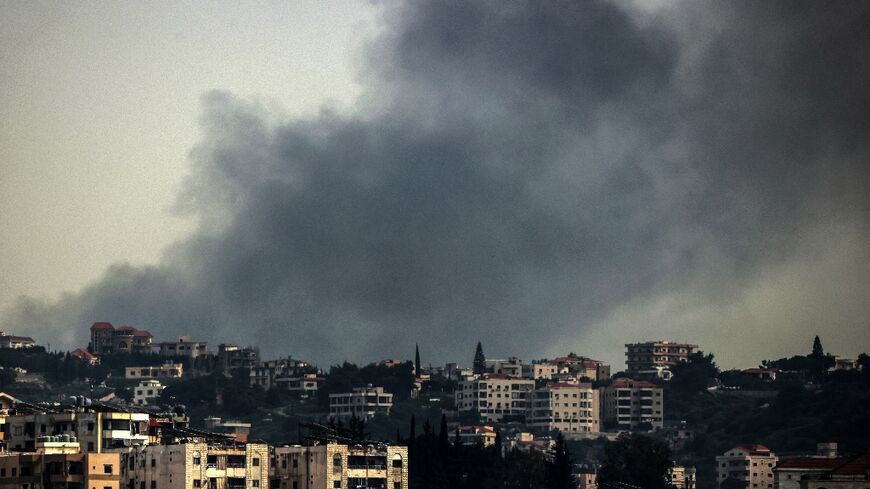 Smoke rises from the site of an Israeli airstrike that targeted the southern Lebanese town of Deir al-Zahrani on April 15, 2026