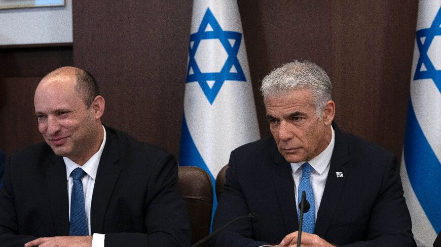 Israeli opposition figures Naftali Bennett and Yair Lapid, seen here in 2022, have both  been outspoken critics of Prime Minister Benjamin Netanyahu's handling of the Gaza war and beyond